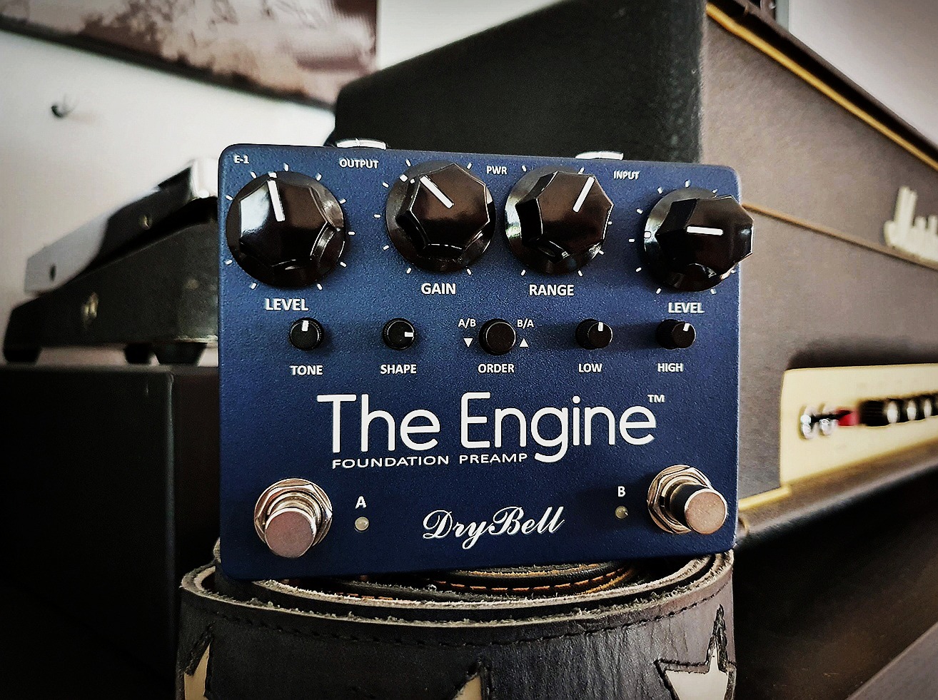 DryBell The Engine guitar pedal next to a Marshall amp.