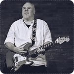 Ian Baker, guitar player, expressing satisfaction with DryBell Unit67 pedal in his testimonial. 