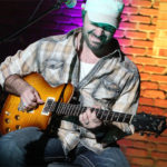 Mick Hayes, guitar player, expressing satisfaction with DryBell Vibe Machine pedal in his testimonial. 