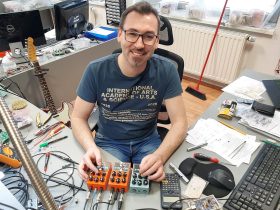 Kristijan 'Kiki' Golub, an external associate and software/hardware engineer at DryBell, working on the Module 4 compressor development at his workbench.