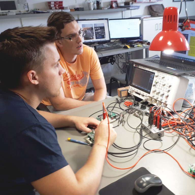 DryBell Guitar Effects team developing production testing procedures.