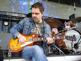 Kruno Domacinovic, guitarist for Majke and DryBell team member, performing with a Gibson Les Paul.