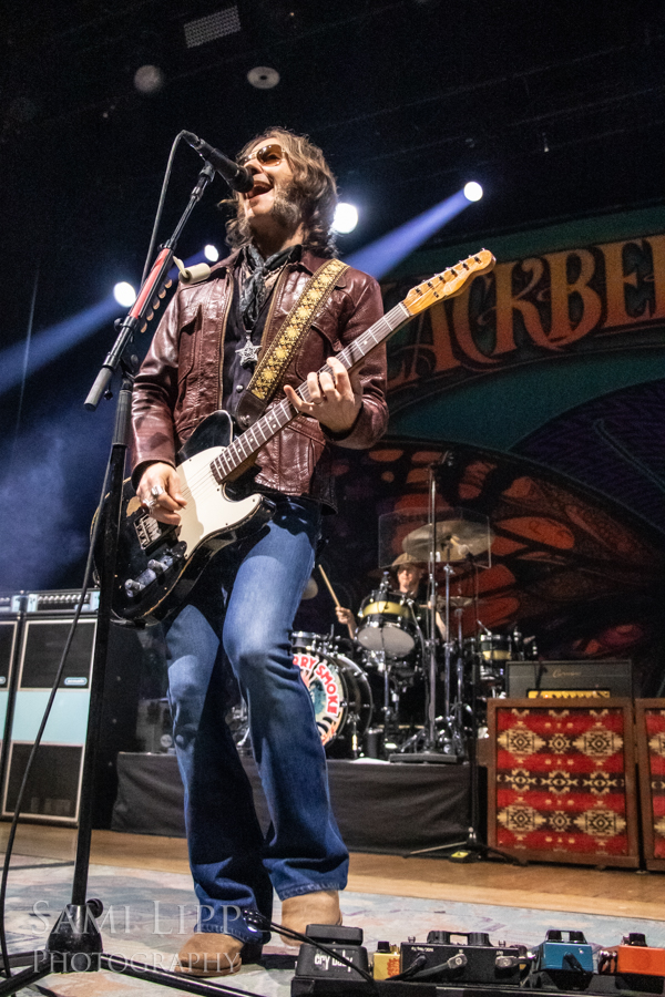 Charlie Starr on stage with his pedalboard featuring the DryBell Vibe Machine V-3. Photo by: Sami Lipp Photography
